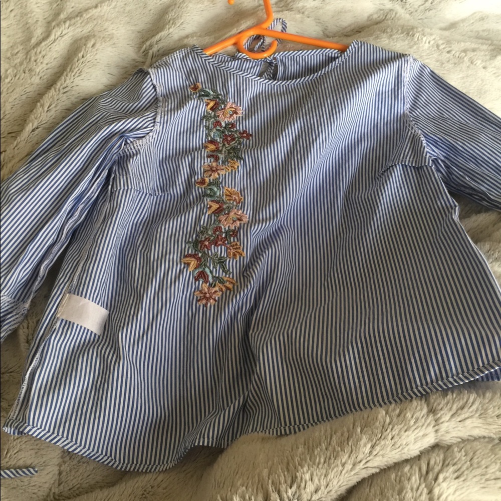 Blue and white flowered blouse